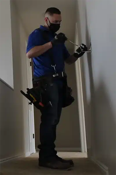 A Black Diamond Technician working in a local Utah home