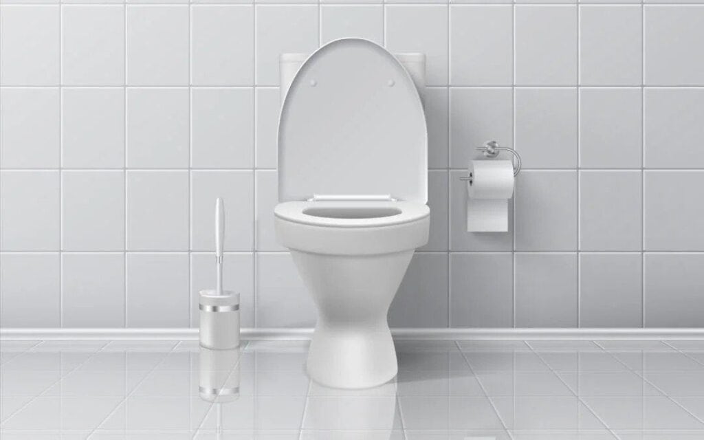 A clean white toilet with open lid sits by a tiled wall, showing the comfort and care Black Diamond Experts bring to your home.